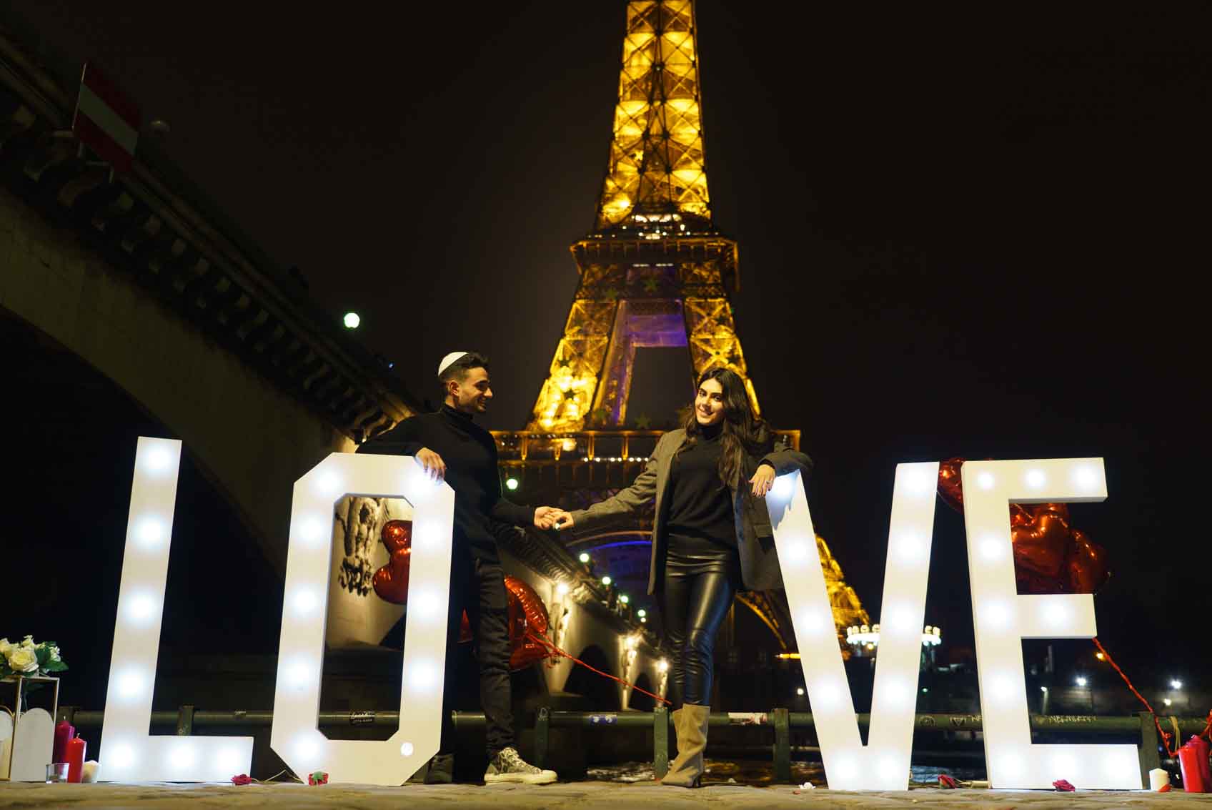 Paris Proposal Eiffel Tower night couple love letters